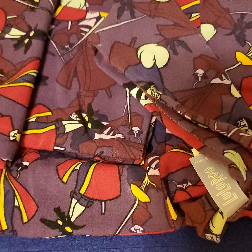 LuLaRoe Purple and Yellow Captain Hook Ladies Leggings Tall And Curvy